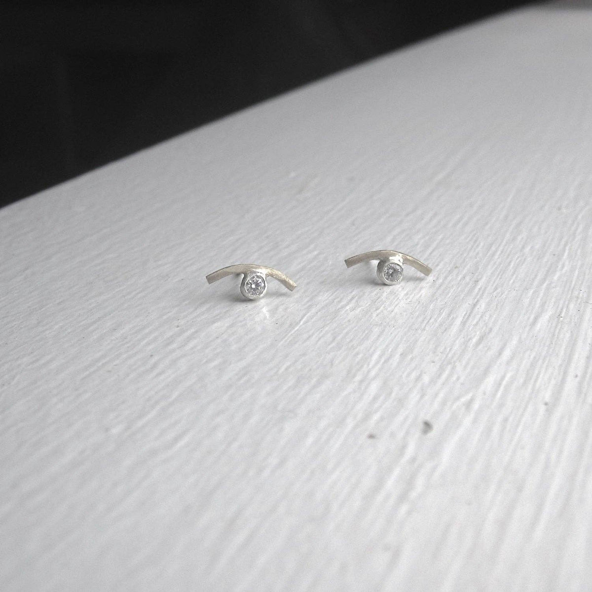 Silver Curved Studs with Clear Stone