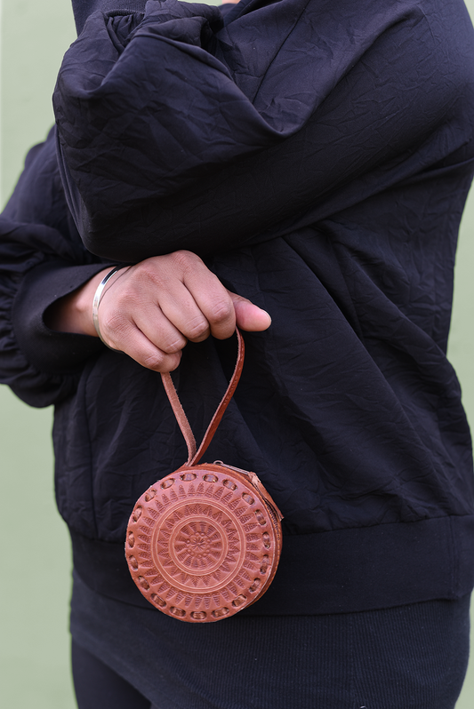 Embossed Leather Circle Wristlet