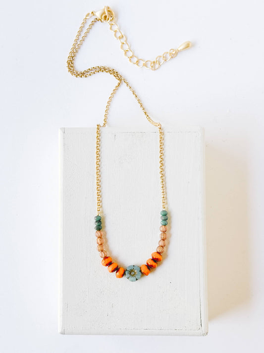 Tiny Blue Flower Necklace With Orange Beads
